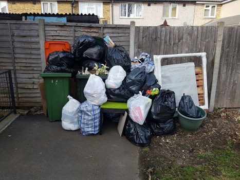 Small skip placed outside a terraced house in Crystal Palace