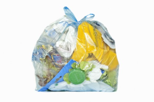 Training session for skip hire staff wearing high-visibility PPE