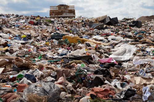 Team of workers removing household waste