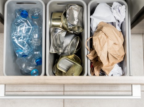 Technician assessing recycling service options